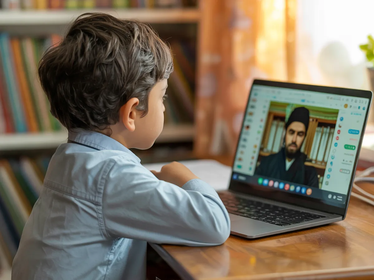 Boy in a live online Quran class with his teacher on the laptop screen